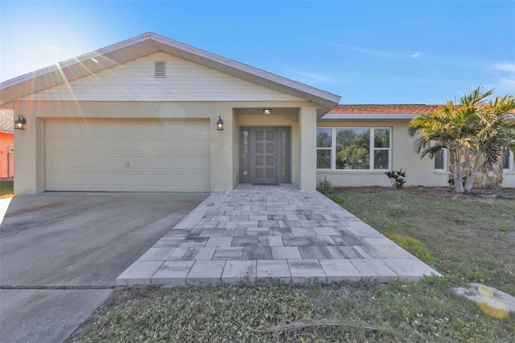 Great curb appeal with newly paved entry way