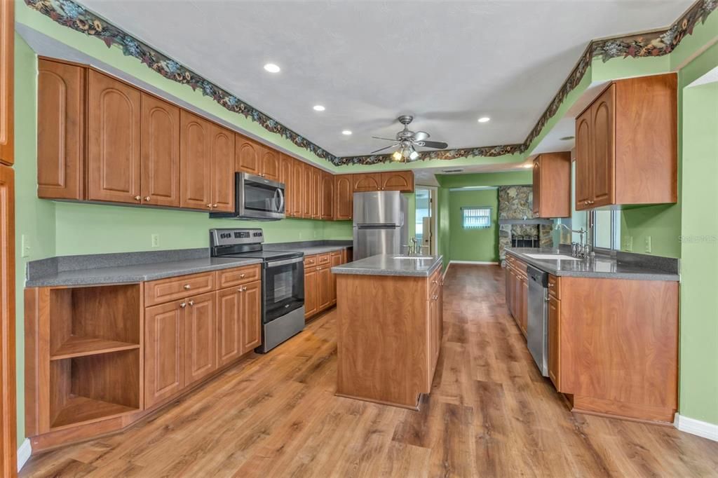 Center Island Kitchen with wood cabinets