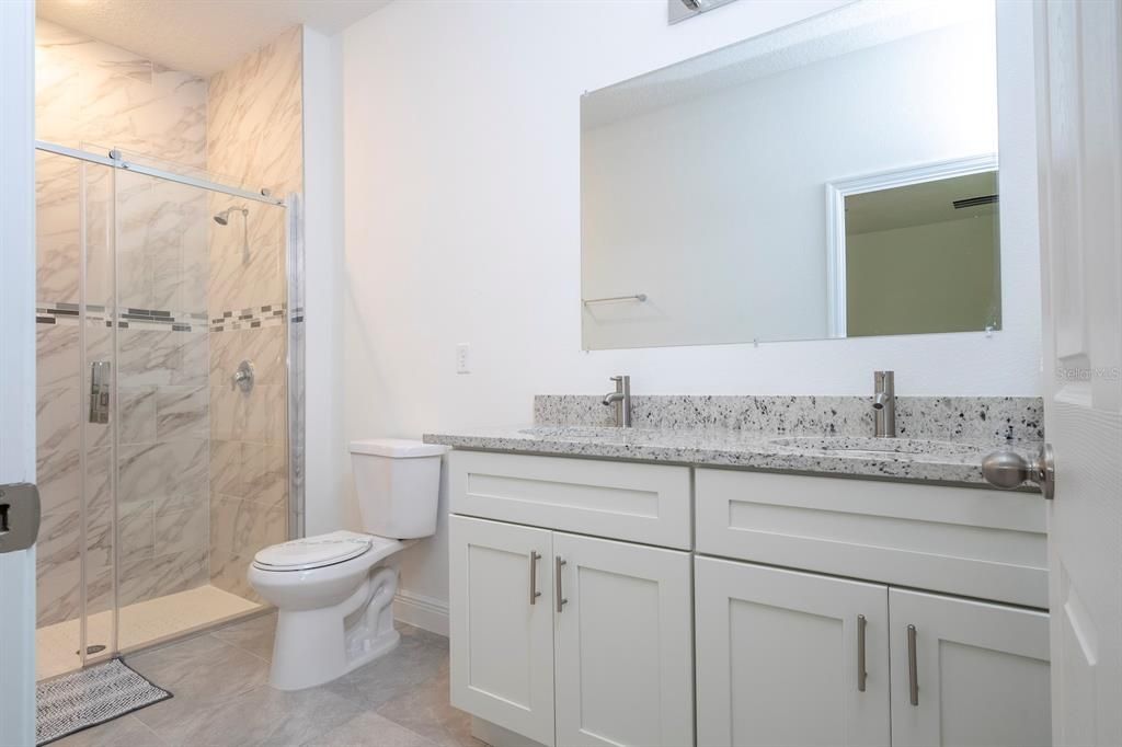 Model home - Shower Door is not included. It is an upgrade