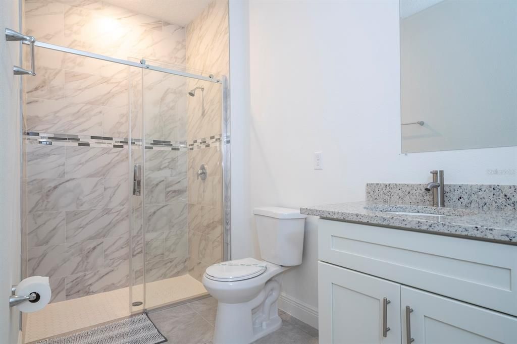 Model home - Shower Door is not included. It is an upgrade