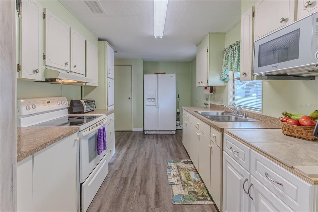 Galley kitchen with amazing storage!