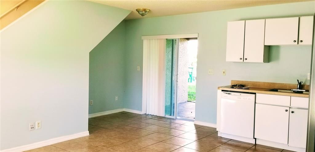 Kitchen with eating area and back patio sliders. New cabinets Jan 2025. new pictures on Jan 8th 2025