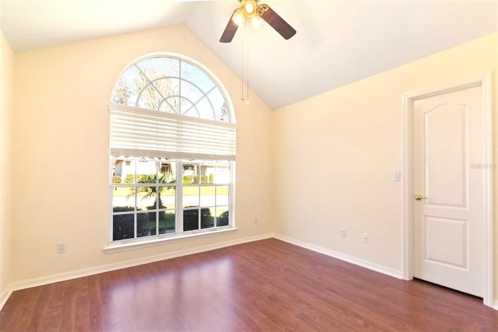 2nd bedroom, arched window, cathedral ceiling