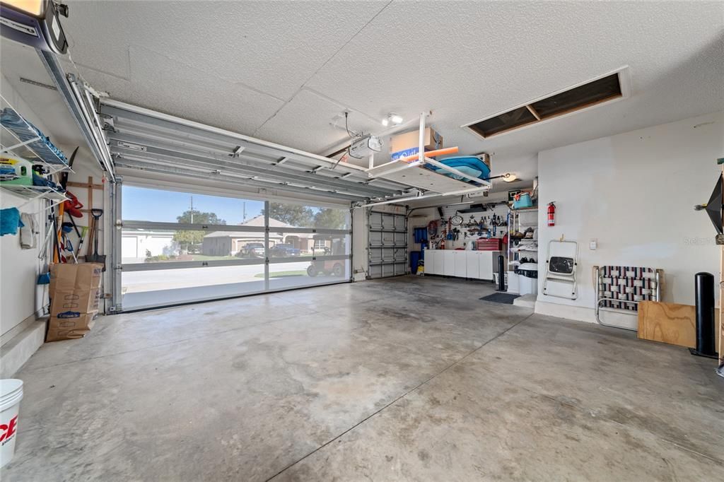 The 2-car garage includes a screen to let the light and air flow in!