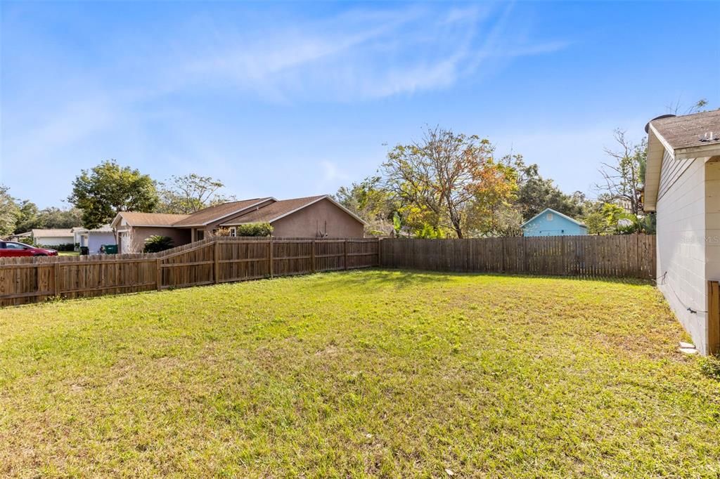 The backyard is completely fenced in.