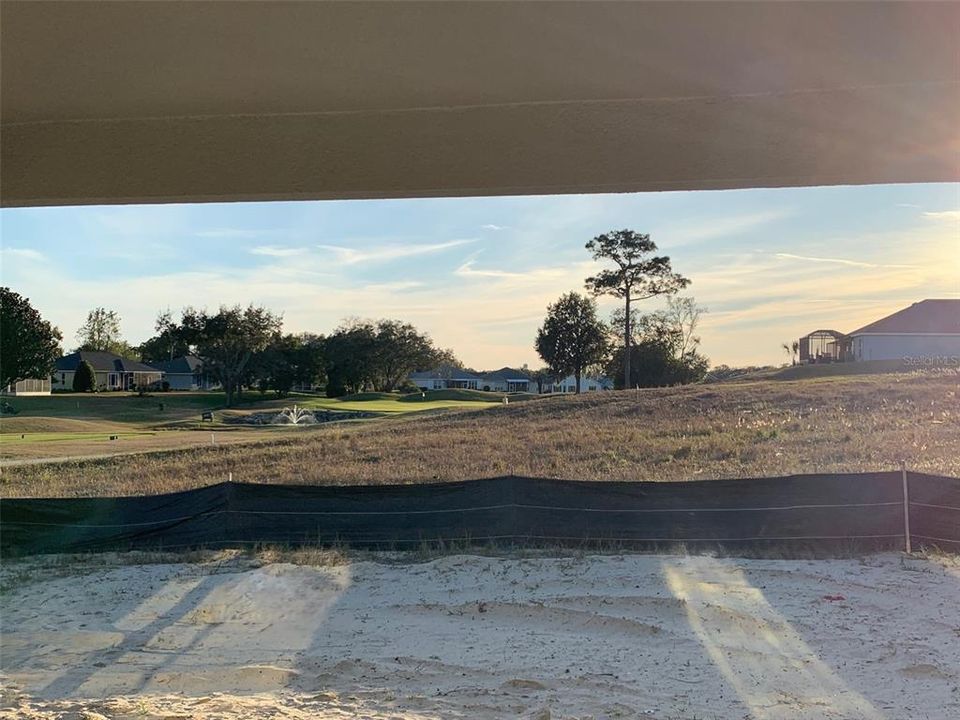 View from large covered back patio