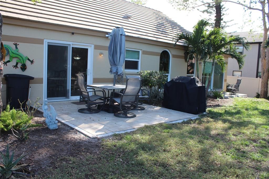 Paver patio overlooking the pond