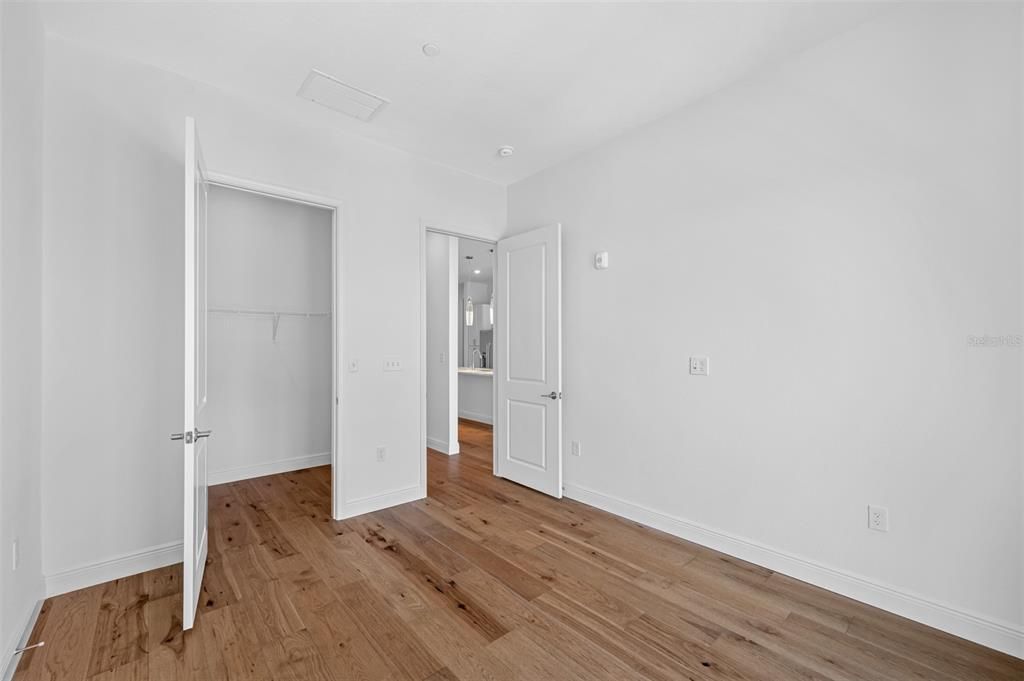 Guest Bedroom with large walk-in closet