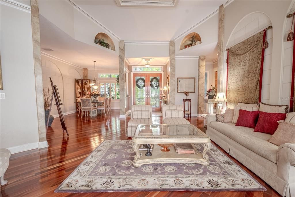 The living room is open to the dining room and foyer.