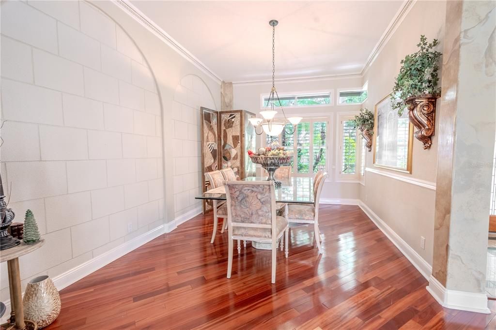 Transom windows bring additional natural light into the dining room.