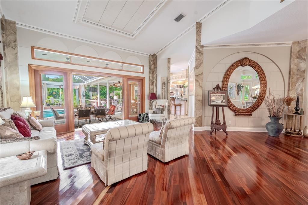 The living and dining rooms make a statement with stunning Brazilian Koa wood flooring, the ultimate in luxury.