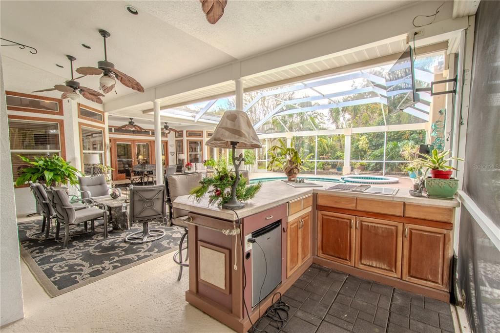 There's an outdoor bar and cabinetry on the lanai.