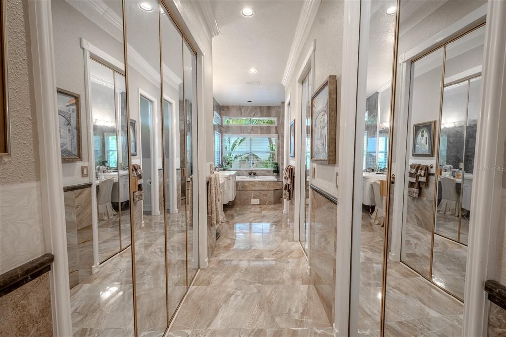 The primary ensuite features porcelain tile, and three mirrored door closets.