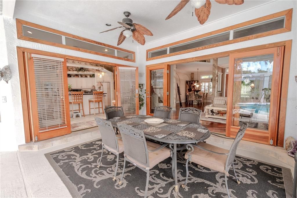 Dining on the lanai, beneath the ceiling fans.