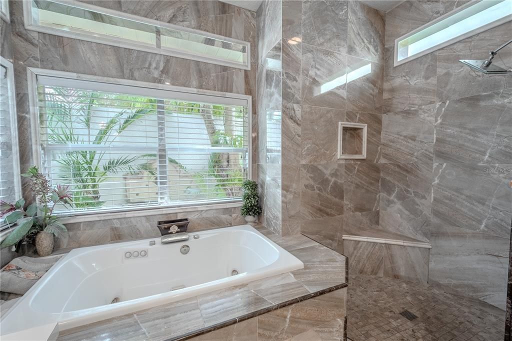 The primary ensuite features a large walk-in shower.