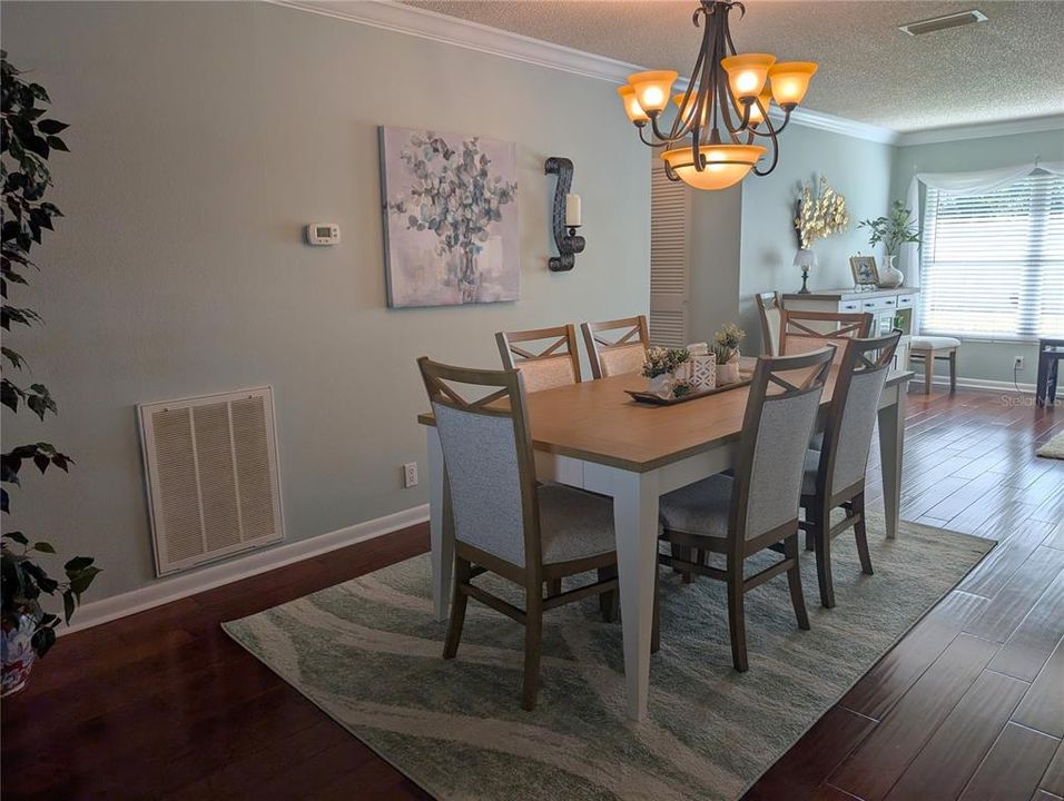 Dining area view of hallway to utility room and Primary ensuite.