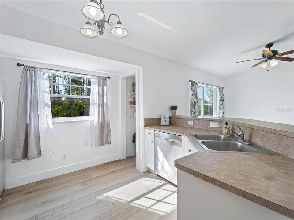 Kitchen with closet pantry