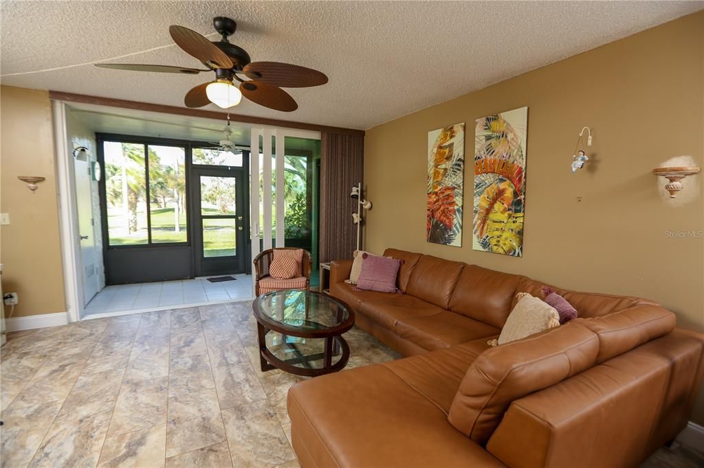 Living room and lanai with high impact sliding doors.