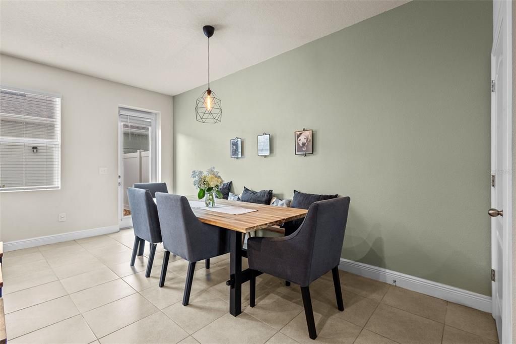 Dining Room - on other side of kitchen, door opens to courtyard in back of home