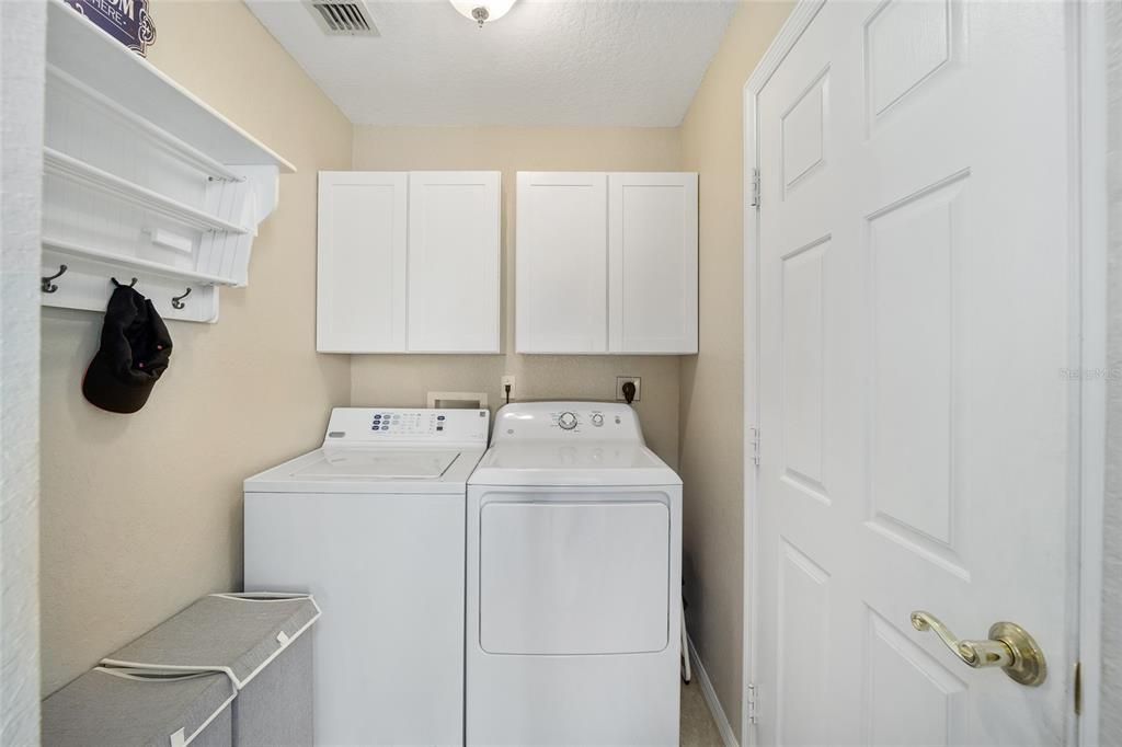 Inside laundry w/cabinets