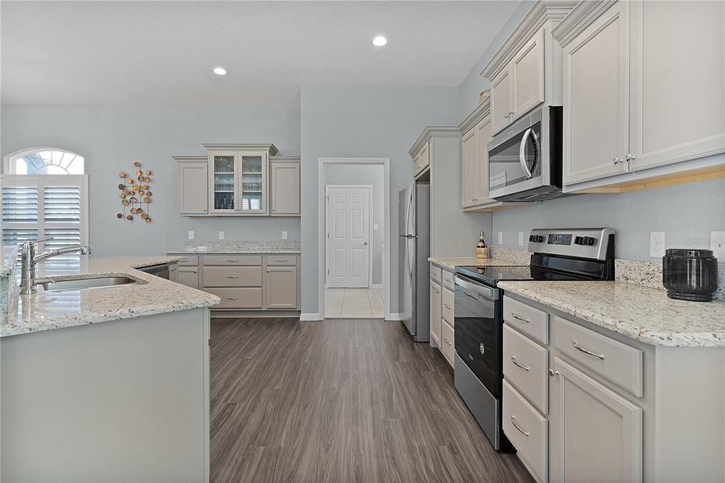 LOOKING THROUGH KITCHEN INTO LAUNDRY ROOM