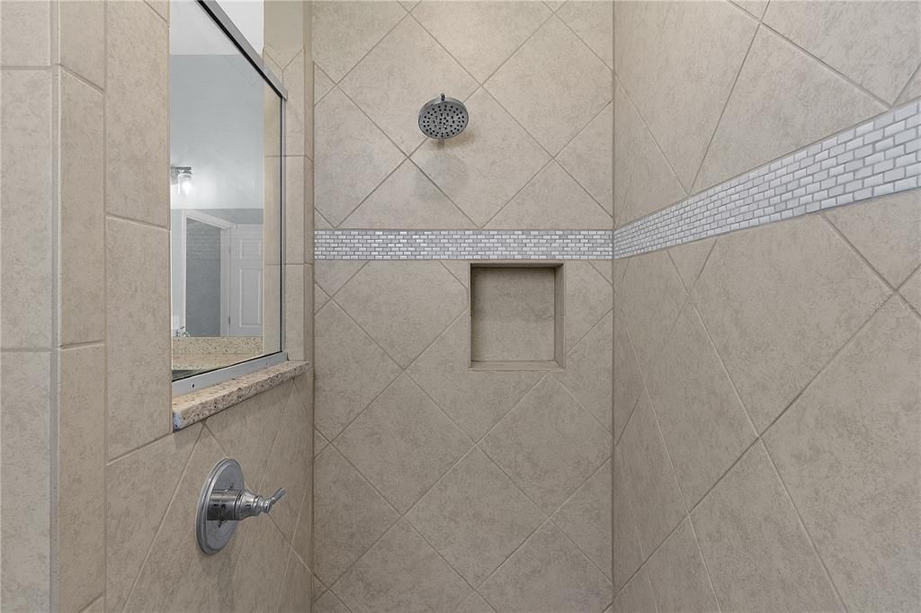 WALK-IN TILE ROMAN SHOWER in PRIMARY BATHROOM