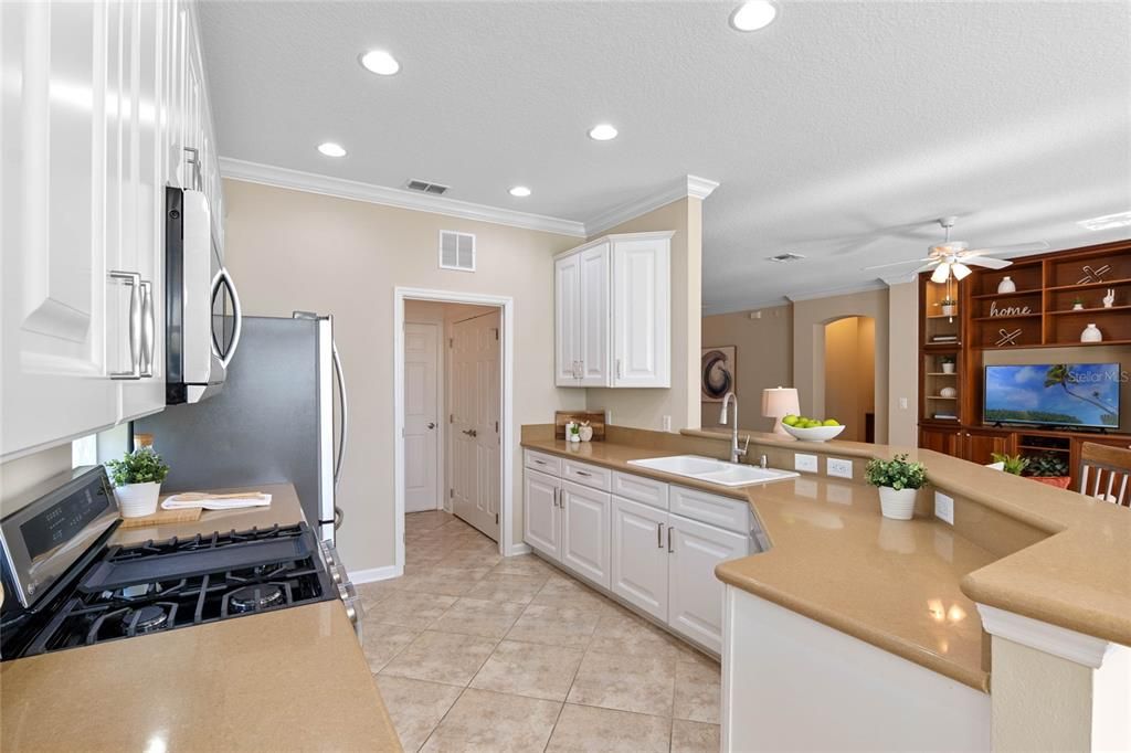 View of the Great Room & built-in entertainment center from the Kitchen