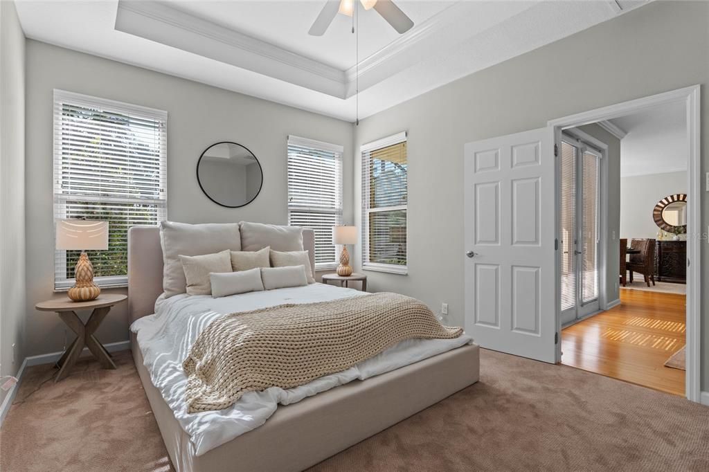 Primary Bedroom w/ double pane windows & a conservation area view