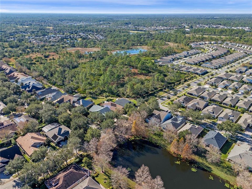 Aerial view of surrounding neighborhood area by home