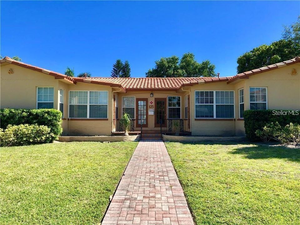 Quiet fourplex with off street parking outside your back door with only a few steps and all one level inside