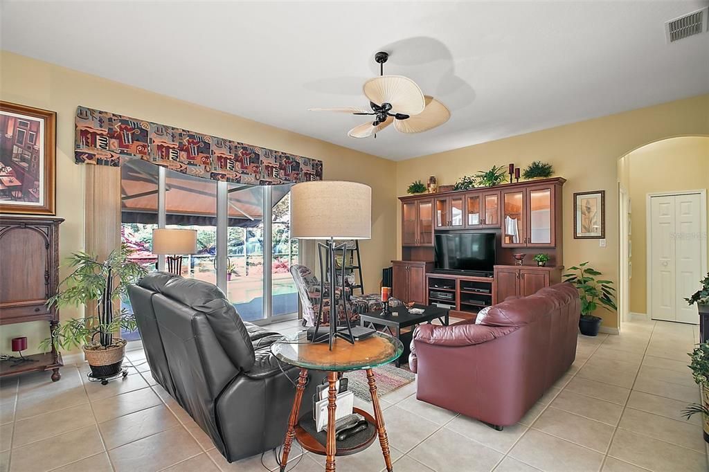 Family Room opens to the pool area. Entertainment Center Included.