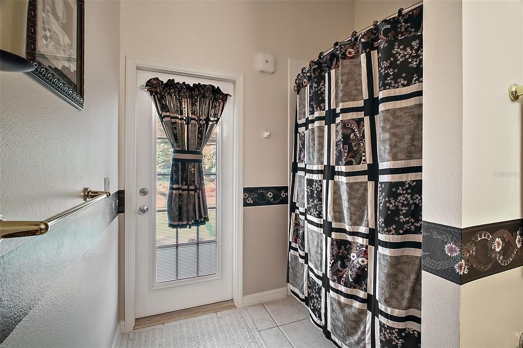 Guest Bathroom with access to the pool area.