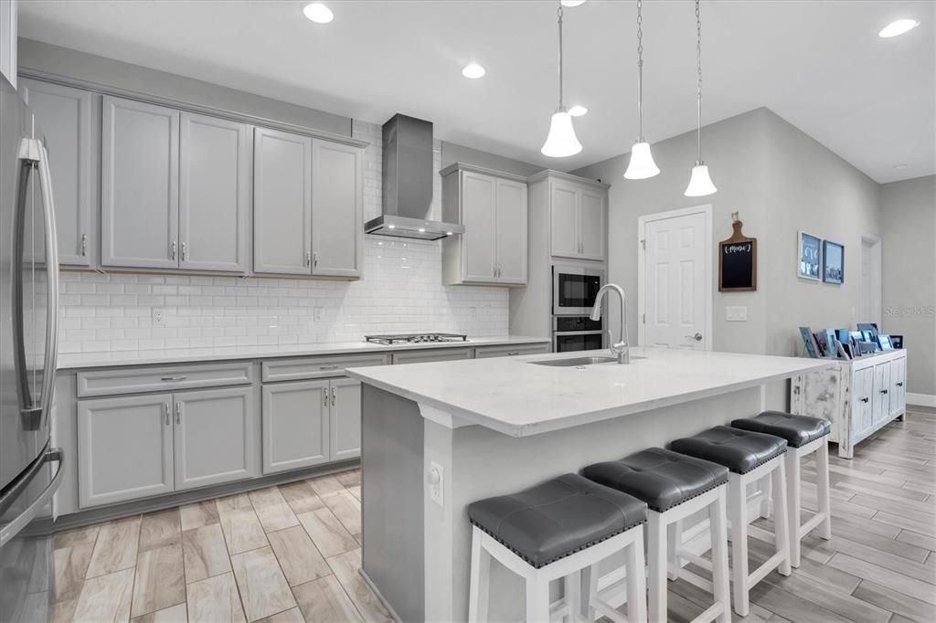 PLENTY OF CABINETS FOR STORAGE AND COUNTER SPACE