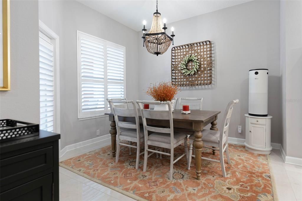 Eat in kitchen area overlooking pool.