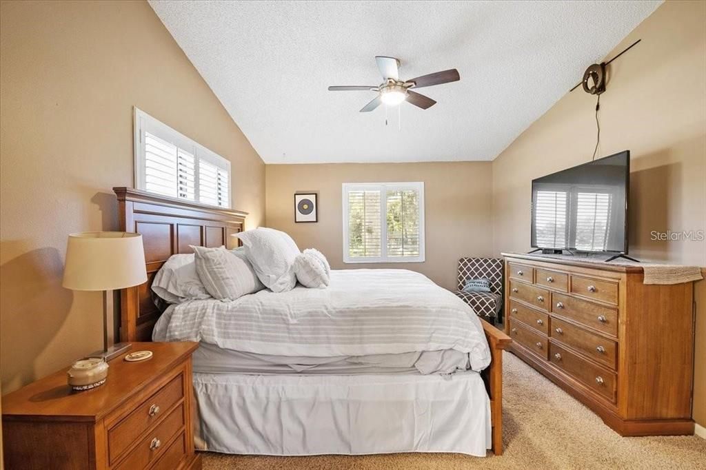 Primary Bedroom with new ceiling fan