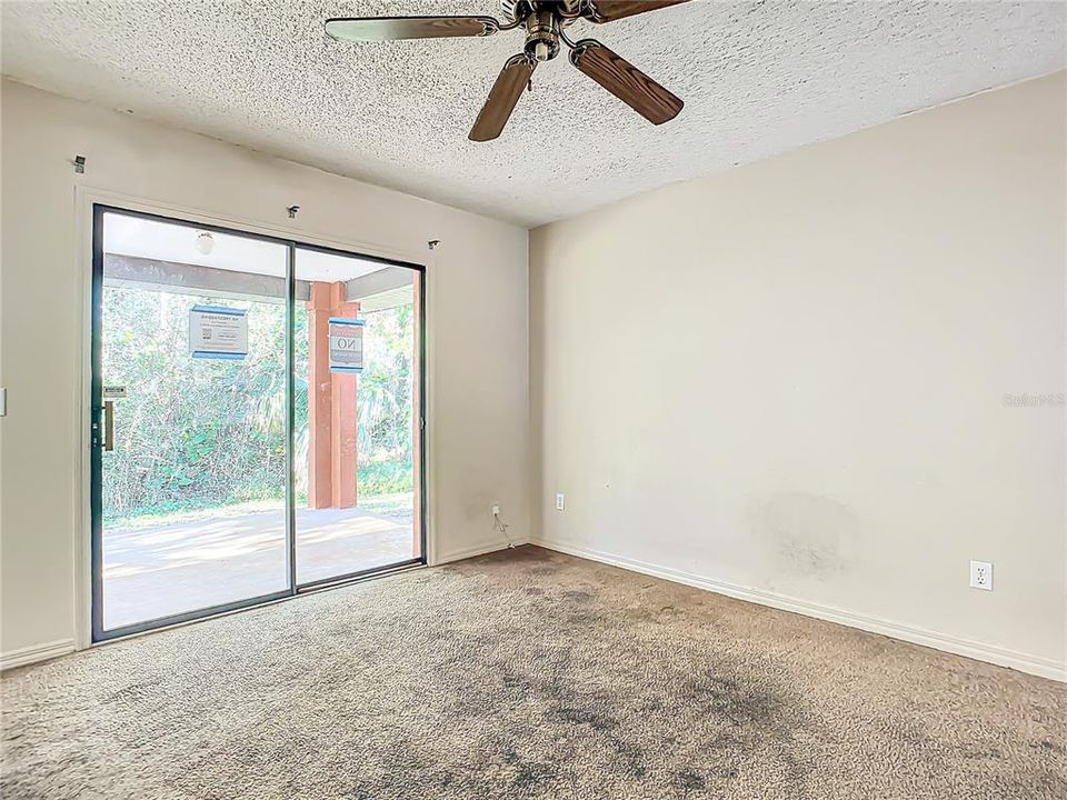 Sliding doors from dining area to covered back patio