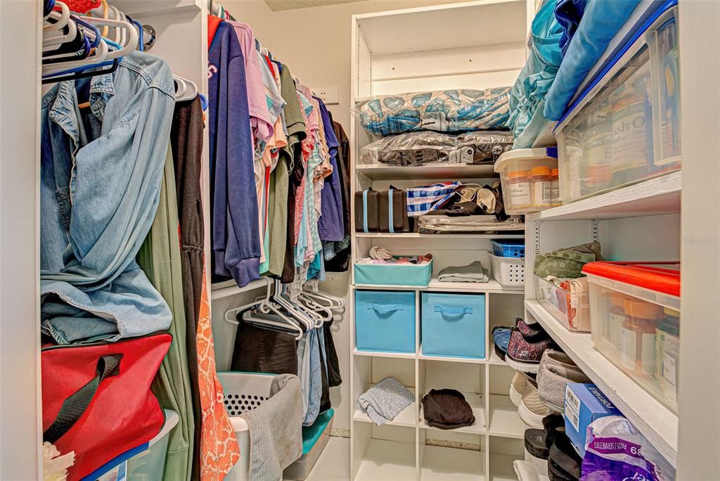 ONE OF TWO PRIMARY WALK-IN CLOSETS