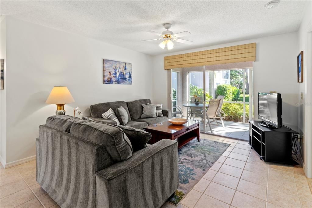 Spacious, beautifully staged (sold turnkey) living room