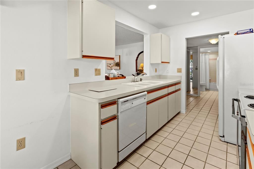 Kitchen offers loads of countertop space and storage