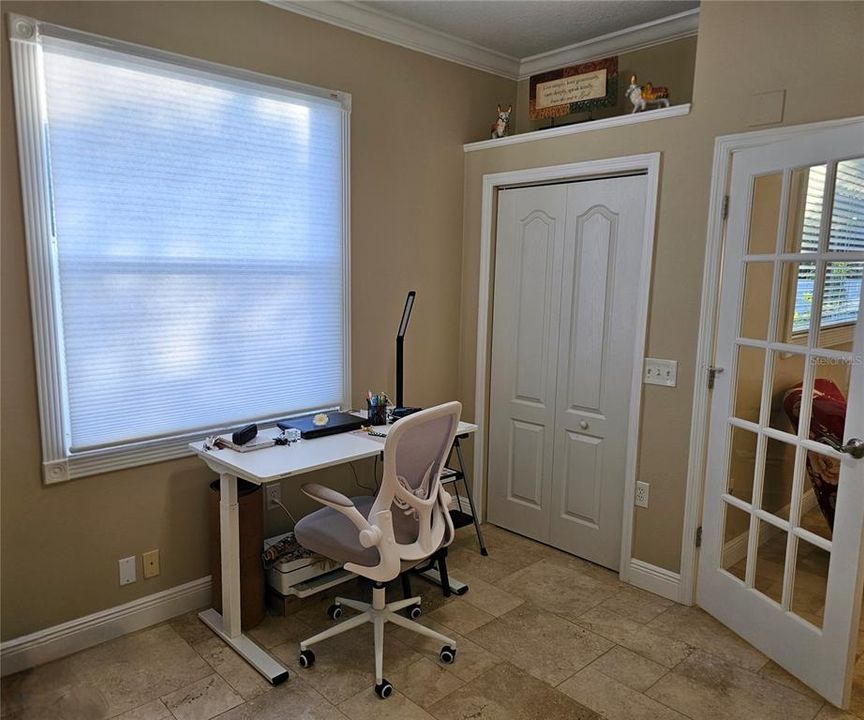 4th bedroom with French doors.