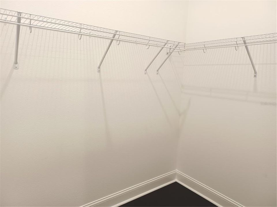 Master walk-in closet - 1 of 2 closets