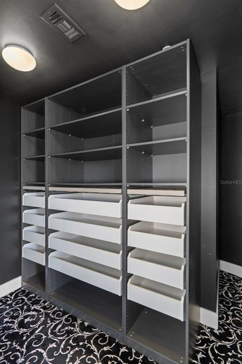 Second-floor guest bedroom closet.