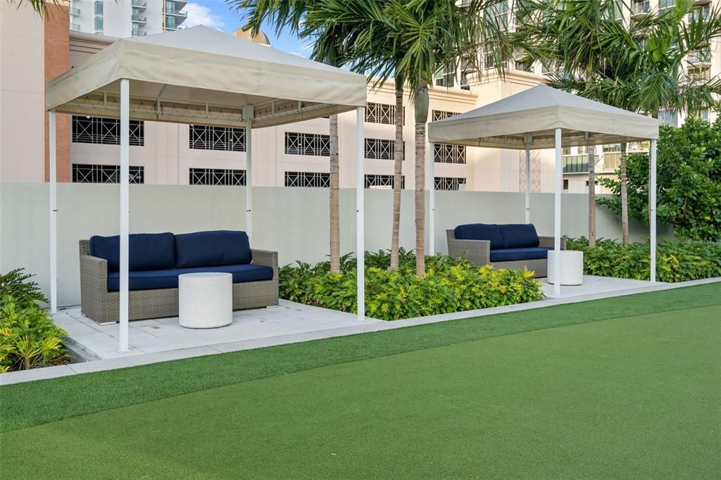 Lounging areas provide plenty of shade and sweeping panoramic views of the water.