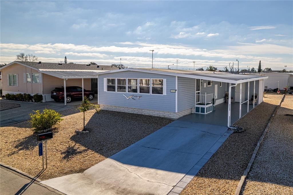 Check this beauty out!  Low/no maintenance yard with adorable entryway