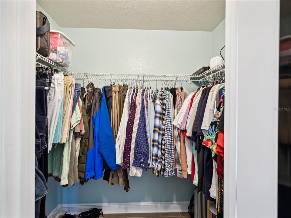 Primary Suite - His Walk-in Closet