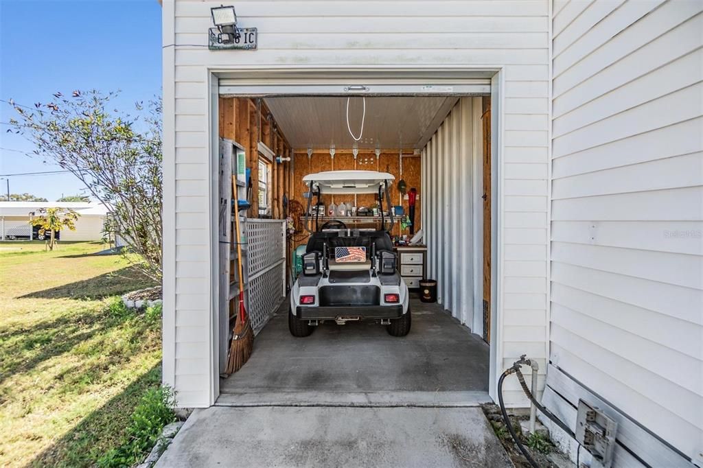 Attached golf cart storage.