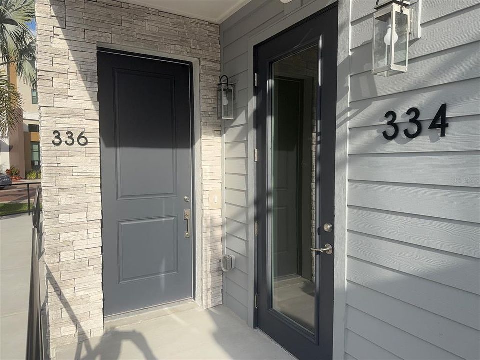 Office/Retail Entry & Owner Townhome Entry.