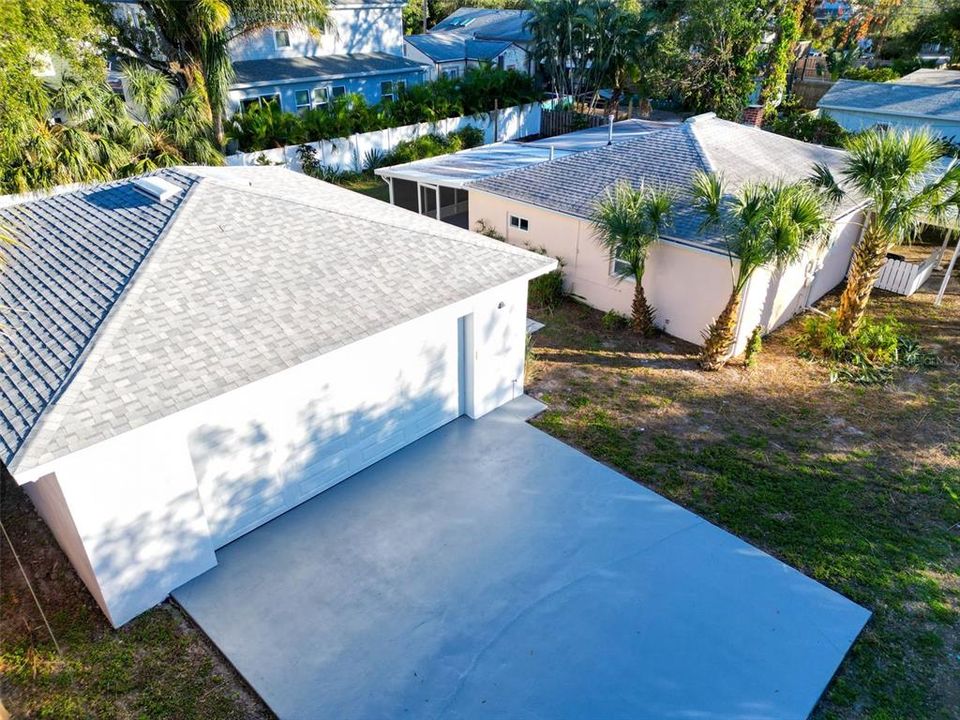 Adjacent 3 car garage fits a boat