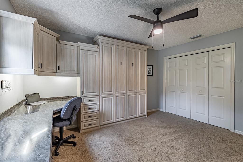 BEDROOM 2 WITH MURPHY BED AND DOUBLE DOOR CLOSET