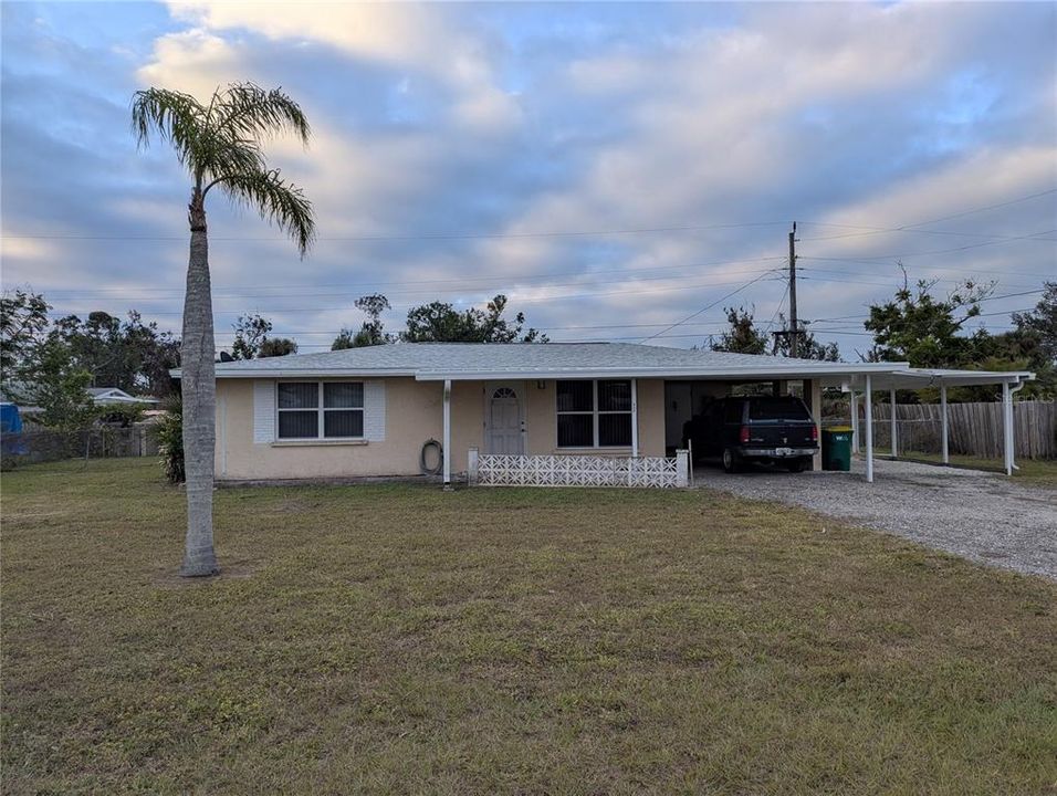 839 E. 4th St. is located in the Rock Creek Park addition on the east side of Pine St. in Englewood.  It's a two bedroom/one bath home with an enclosed lanai and two covered parking spaces.